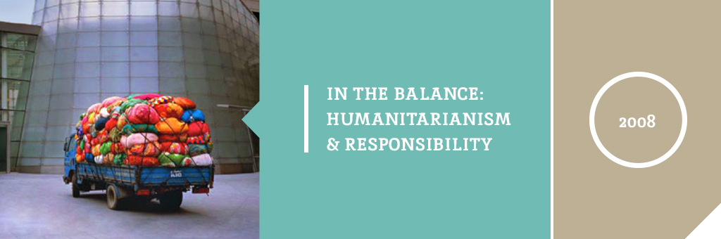 A photo of a flatbed truck stacked with colorful fabric next to the text "In the Balance: Humanitarianism and Responsibility 2008"